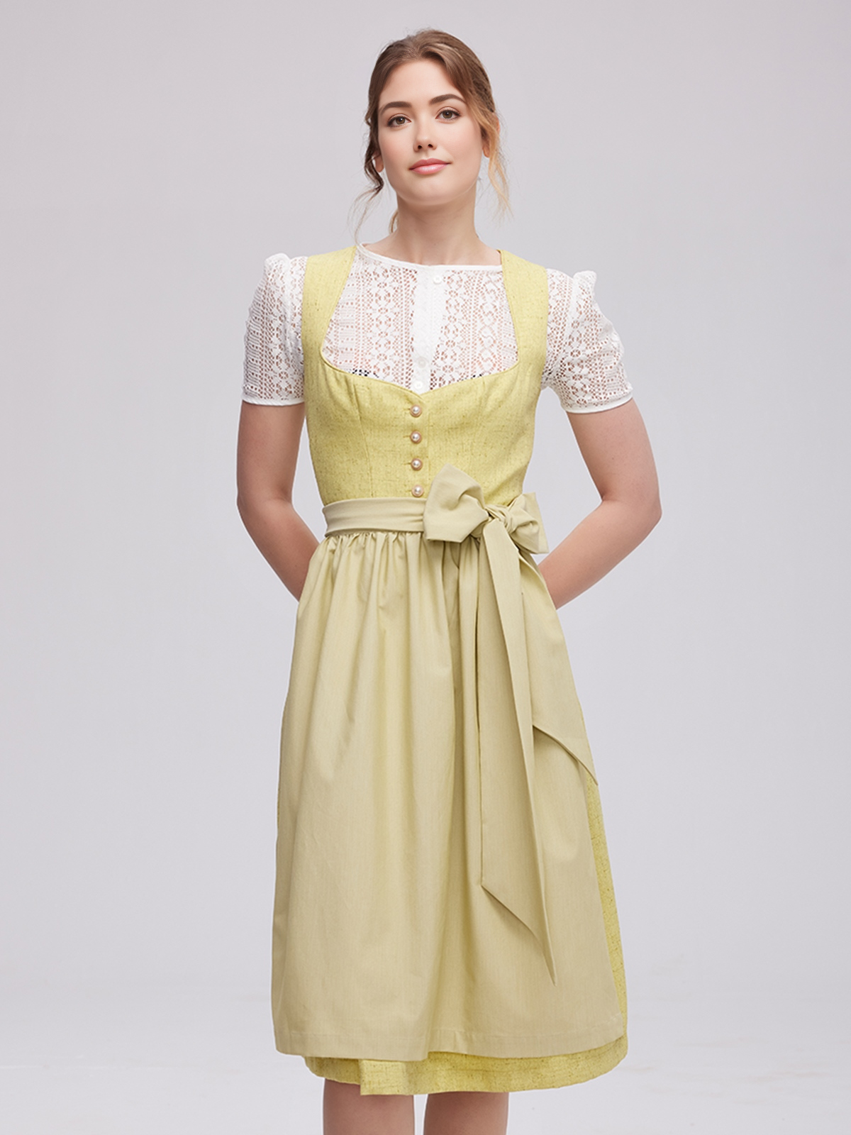 Dirndl in Gelb mit traditionellem Schnitt